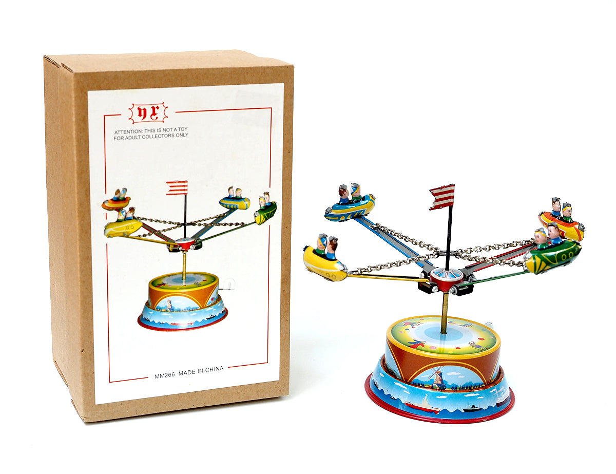 Rocket Carousel Tin Toy