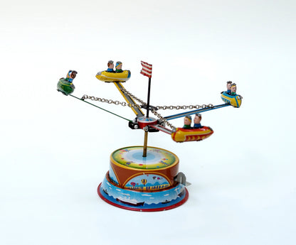Rocket Carousel Tin Toy