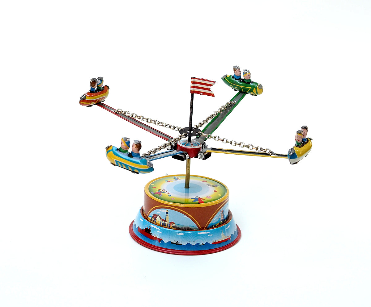 Rocket Carousel Tin Toy